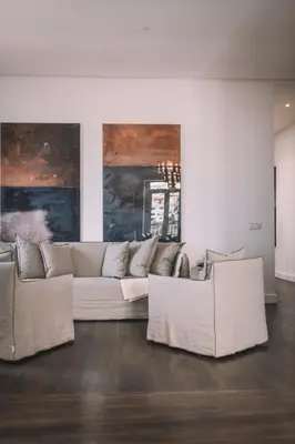 a living room with a white couch in a room at QUINTA TORRINHA PANORAMA Apartment in Funchal