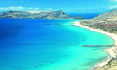 a view of a beach with blue water at Casa Gouveia in Porto Santo