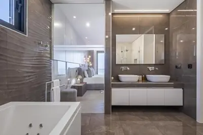 a bathroom with two sinks and a large mirror at Villa Boa Nova Preta by LovelyStay in Funchal