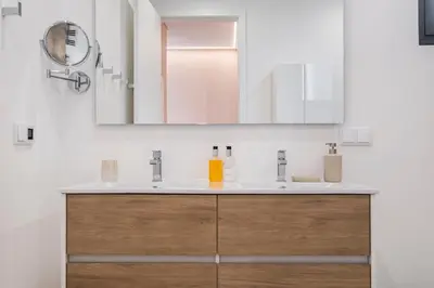 a bathroom with a sink and a mirror at Villa Boa Nova Branca by LovelyStay in Funchal