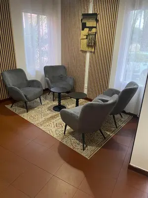 a living room with a counter and a room with a door at Casa De Cha Prazeres in Prazeres