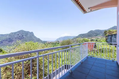 a balcony with a view of the mountains at Villa Pearl in Santana