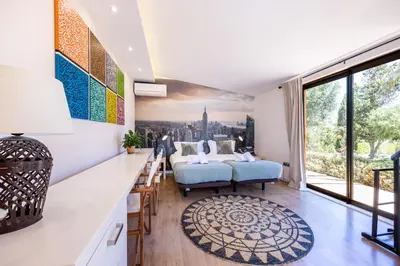 a living room with a view of a city at Villa Cercado, private swimming pool in Sagres