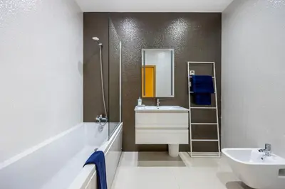 a bathroom with a sink and a mirror at CoolHouses Algarve Lagos, 3 Bed modern Flat, outdoor & Indoor pools, Gym, Amor à Vida in Lagos
