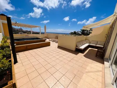 a patio with a view of the ocean at Casa da Pedreira in Porto Santo