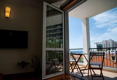 a balcony with a view of the city at Madeira Precious Penthouse in Funchal