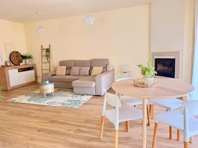 a dining room with a wooden table and chairs at Casa Kiko in Burgau