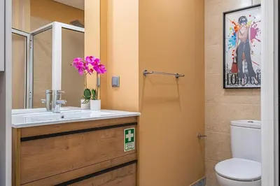 a bathroom with a sink and a toilet at Urban Paradise by Homie in Funchal