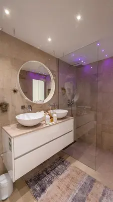 a bathroom with two sinks and a mirror at Little Townsuite Funchal in Funchal