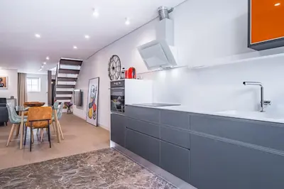 a kitchen with a sink and a counter top at Casa do Batente - By WeHost in Funchal