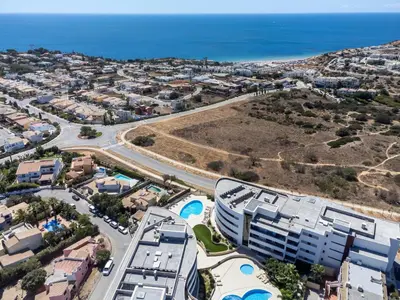 an aerial view of a city and the ocean at Spacious 2 bedroom Apartment with Sea View Lagos by Lisbeyond in Lagos