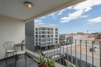 a balcony with a view of a building at Santa Luzia II by An Island Apart in Funchal