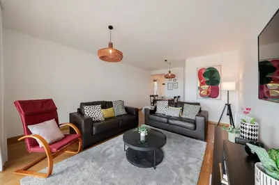 a living room with a couch and a table at Santa Luzia II by An Island Apart in Funchal