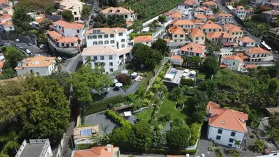 an aerial view of a town with houses at VILLA QUINTA TORRINHA Rooms in Funchal