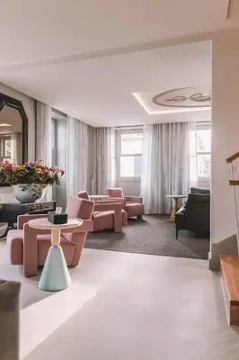 a living room with couches and tables at VILLA QUINTA TORRINHA Rooms in Funchal