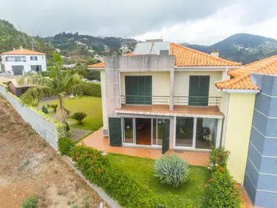 a view of a house with a yard at Villa Valeriu in Santa Cruz