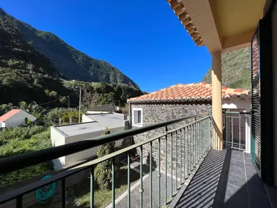 a balcony with a view of a mountain at Briola by AnaLodges in São Vicente