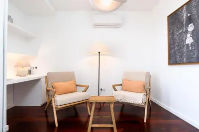 a bedroom with a bed with a view of the ocean at Unmei by LovelyStay in Caniço