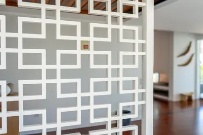 a living room with a couch and a table at Unmei by LovelyStay in Caniço