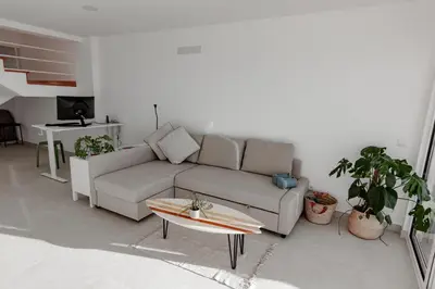 an empty room with a view of the ocean at Arrifana Sunset Sea View Villa in Praia da Arrifana