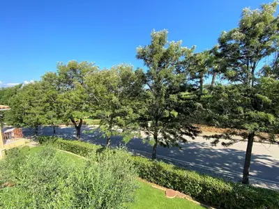 a view of a park with trees and grass at Apartamento Boavista in Lagos