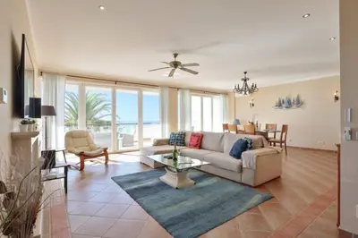 a living room with a couch and a table at Casa del Mar - Amazing Villa with Sea View & Pool in Luz
