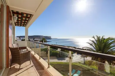 a balcony with a view of the ocean at Casa del Mar - Amazing Villa with Sea View & Pool in Luz