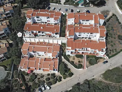 an overhead view of a group of houses with red roofs at 413 Casa Marsalema in Salema