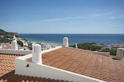 a view of the ocean from the roof of a house at 413 Casa Marsalema in Salema