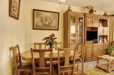 a hotel room with a bed and a balcony at Palheiro Residence Familiar 2 in Funchal
