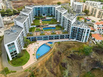 an aerial view of a building with a pool at Lexus Avenue by LovelyStay in Funchal