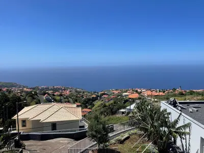 a house with a view of the ocean at King´s View (Heated Pool and Sea View) in Estreito da Calheta