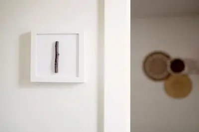 a white door with a picture of a letter on it at Seven Funchal Apartments in Funchal