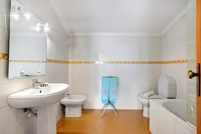 a bathroom with a shower and a sink and a toilet at Apartamento A Quinta Porto Santo in Campo de Baixo