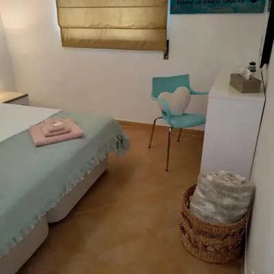a hospital room with a bed and a chair at Appartement Willy St. James Luz in Luz