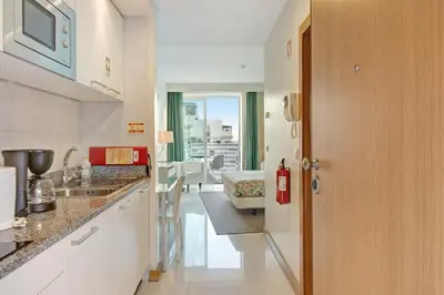 a kitchen with a sink and a counter top at Dfm Happy Days F - Funchal in Funchal