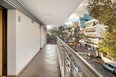 a balcony with a view of a city at Dfm Happy Days D - Funchal in Funchal