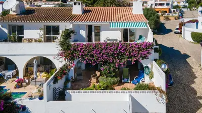 an aerial view of a house with flowers at CoolHouses Algarve Luz, 3 Bed Townhouse, central & superb view, Casa Salute (100066/AL) in Luz