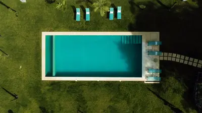 an overhead view of a large swimming pool at Villa Camélia Boutique House in Camacha