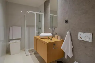 a bathroom with a sink and a shower at Villa das Quebradas by An Island Apart in Funchal