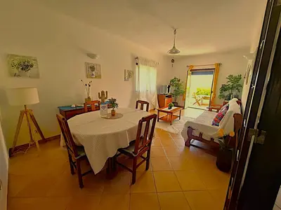 a kitchen with a sink with a wooden counter top at Arrifana Beach- T2 Sun & Surf Flat in Aljezur