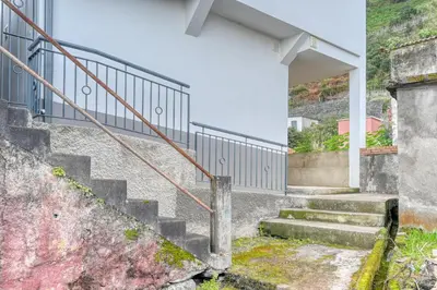 a set of stairs leading up to a building at Casa Familia Pestana 2, a Home in Madeira in Seixal