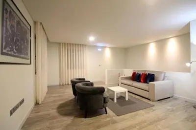 a living room with a couch and two chairs at Villa Camacho iv - Mansion House in Arco da Calheta