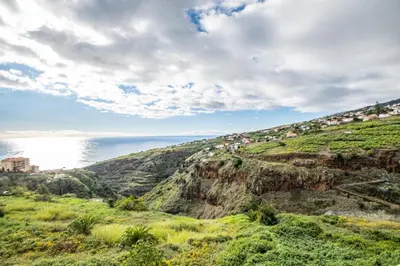 a view of a hill with houses on it at Bela Vista Sea View in Venda do Atalhinho