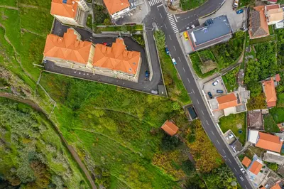 an overhead view of a house with an orange roof at Bela Vista Sea View in Venda do Atalhinho