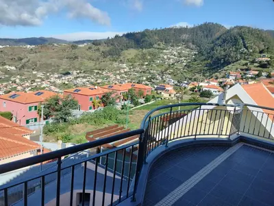 a balcony with a view of a city at Beautiful View 2 - Arco da Calheta - Ilha da Madeira in Arco da Calheta