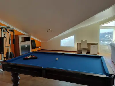 a living room with a pool table in it at Beautiful View 2 - Arco da Calheta - Ilha da Madeira in Arco da Calheta
