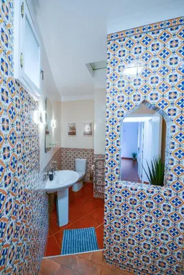 a bathroom with a sink and a mirror at The Secret Corner of Luz in Luz