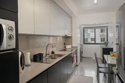 a kitchen with a sink and a counter top at Madalenas XXI by An Island Apart in Funchal