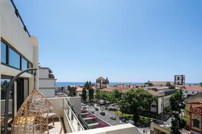 a view of the city from the balcony of a building at Atlantic Blue 1 - central and with garage in Funchal